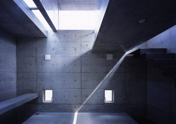 Architectural concrete detail with dramatic natural light