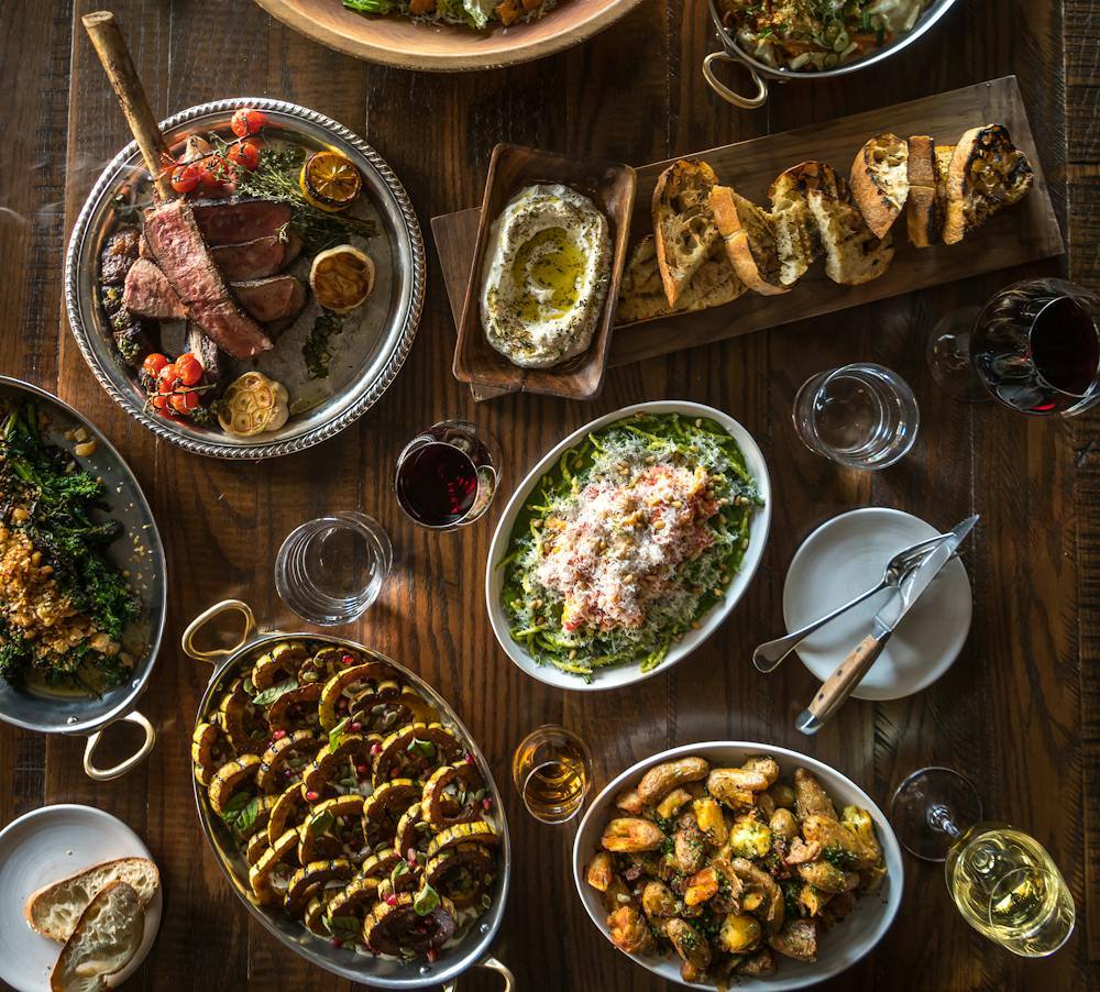 A table spread of small plates