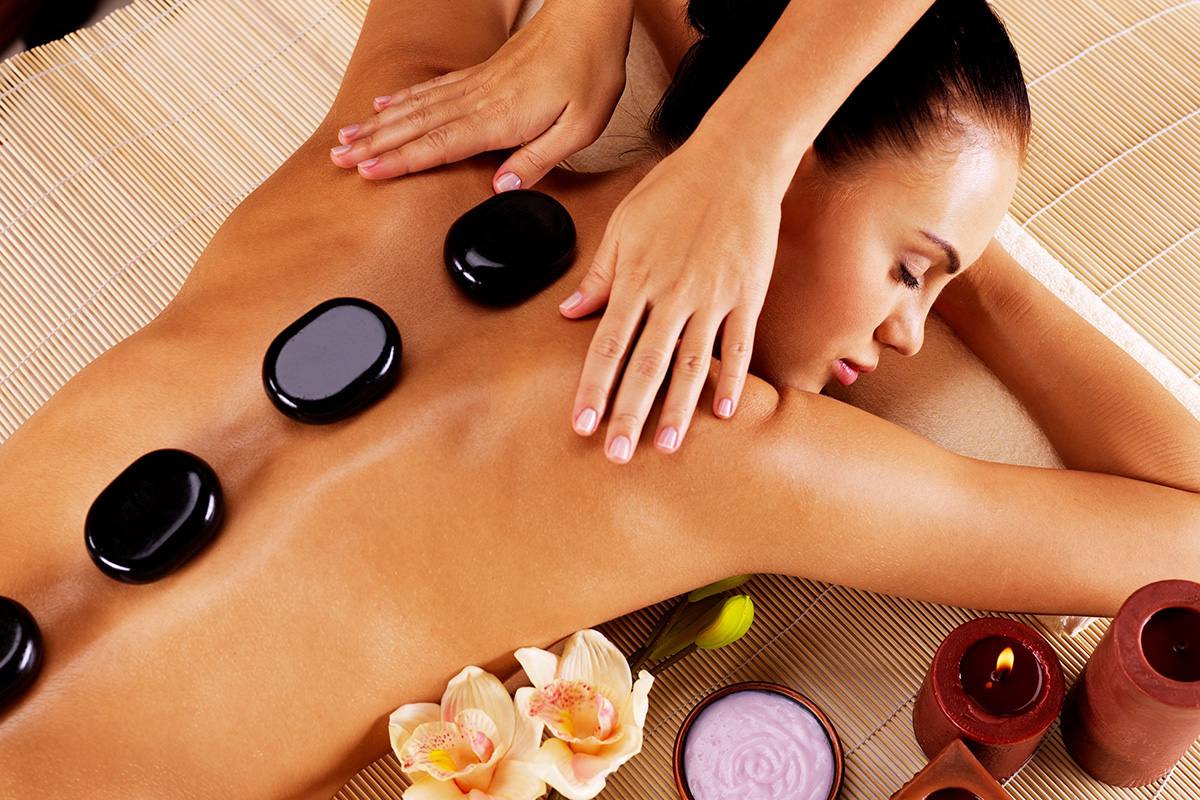A calm massage therapy session in soft light